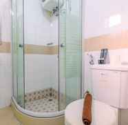 In-room Bathroom 5 Homey and Cozy Studio Apartment at Metropark Condominium Jababeka By Travelio