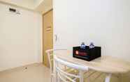 Common Space 4 Cozy and Homey Living 1BR + Working Room at Meikarta Apartment By Travelio