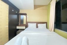 Bedroom Pleasant & Cozy 2BR Apartment at The Jarrdin Cihampelas By Travelio