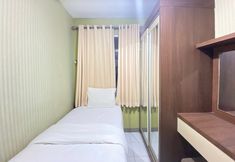 Bedroom 2 Pleasant & Cozy 2BR Apartment at The Jarrdin Cihampelas By Travelio