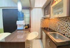 Common Space 4 Pleasant & Cozy 2BR Apartment at The Jarrdin Cihampelas By Travelio