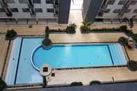 Swimming Pool Comfortable 2BR Apartment with AC in Living Room at The Jarrdin Cihampelas By Travelio