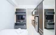 Ruang untuk Umum 2 Comfy and Modern Studio Apartment at Patraland Urbano By Travelio