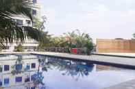 Swimming Pool Homey and Comfortable Studio at Titanium Square Apartment By Travelio