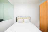 ห้องนอน Homey and Comfortable Studio at Titanium Square Apartment By Travelio