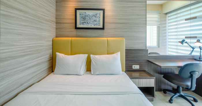 Bedroom Comfortable Studio Room Apartment at Grand Kamala Lagoon By Travelio