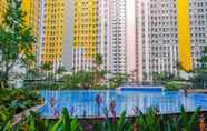 Swimming Pool 5 Strategic Studio Apartment at Springlake Summarecon Bekasi By Travelio