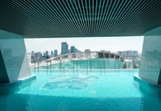 Swimming Pool 7 Comfort and Strategic Studio at Menteng Park Apartment By Travelio