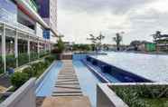 Lobby 6 Comfort Living 2BR Apartment at Green Pramuka City By Travelio