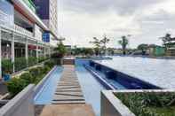 Lobby Comfort Living 2BR Apartment at Green Pramuka City By Travelio