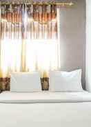 BEDROOM Comfort Living 2BR Apartment at Green Pramuka City By Travelio