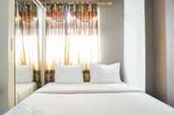Bedroom Comfort Living 2BR Apartment at Green Pramuka City By Travelio
