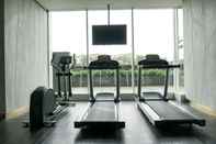 Fitness Center Luxury Design 2BR Apartment at Ciputra International By Travelio