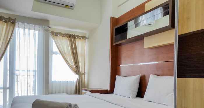 Bedroom Cozy Studio Apartment at Vida View Makassar By Travelio