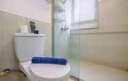 In-room Bathroom 6 Homey and Comfy 2BR at Meikarta Apartment By Travelio