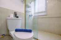 In-room Bathroom Homey and Comfy 2BR at Meikarta Apartment By Travelio