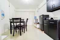 Lobby Scenic 2BR Apartment with City View at Bassura City By Travelio
