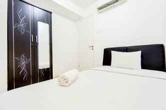 Bedroom 4 Scenic 2BR Apartment with City View at Bassura City By Travelio