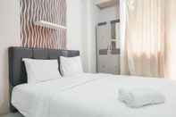 Bedroom Comfy Studio near Mall at Green Pramuka City Apartment By Travelio