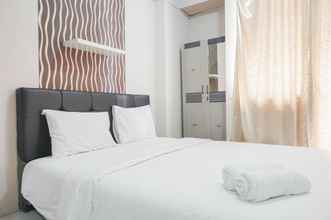 Bedroom 4 Comfy Studio near Mall at Green Pramuka City Apartment By Travelio