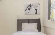 Bedroom 2 Comfort 2BR Apartment at Meikarta By Travelio