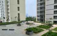 Bangunan 7 Modern and Nice 2BR at Daan Mogot City Apartment By Travelio