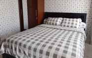 Bedroom 6 Rose Rooms @ Apartemen Margonda Residence