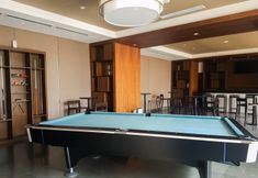 Entertainment Facility 7 Spacious and Comfort 3BR at Branz BSD City Apartment By Travelio