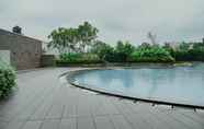 Swimming Pool 6 Fully Furnished with Comfortable Design 1BR at Pejaten Park Residence By Travelio
