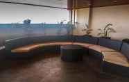 Lobby 7 Homey and Comfy Studio at Grand Kamala Lagoon Apartment By Travelio