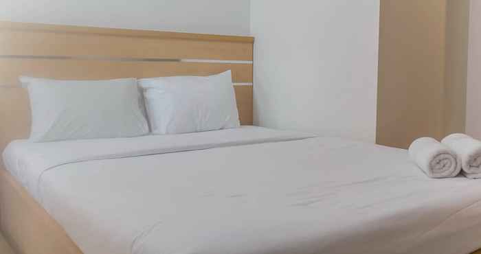 Bilik Tidur Homey and Comfy Studio at Grand Kamala Lagoon Apartment By Travelio