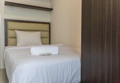 침실 2 Cozy and Chic 2BR Grand Kamala Lagoon Apartment By Travelio