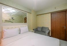 Bedroom 2 Homey and Relax Studio at Cinere Resort Apartment By Travelio