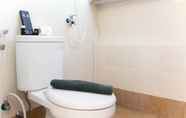 In-room Bathroom 5 Comfy and Nice 2BR Bassura City Apartment near Mall By Travelio