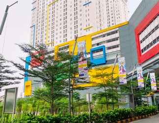 Bangunan 2 Comfy and Nice 2BR Bassura City Apartment near Mall By Travelio