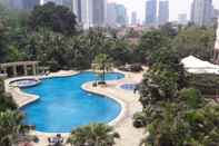 Swimming Pool Spacious 2BR Sudirman Tower Apartment Semanggi By Travelio