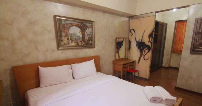 Bedroom Spacious 2BR Sudirman Tower Apartment Semanggi By Travelio