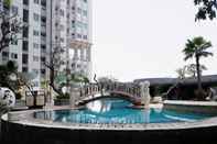 Bangunan Cozy 1BR Sky Terrace Lagoon Condo Apartment near Daan Mogot Mall By Travelio