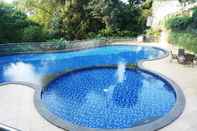 Swimming Pool Pleasant 1BR Apartment at Dago Suites near ITB By Travelio