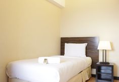 Bedroom 2 Comfy and Gorgeous 2BR at Braga City Walk Apartment By Travelio