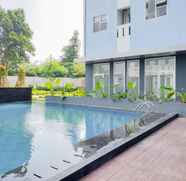 Swimming Pool 3 Minimalist Studio at Urbantown Serpong Apartment By Travelio