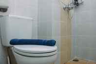 In-room Bathroom Simple and Homey Studio Apartment at Taman Melati Margonda By Travelio