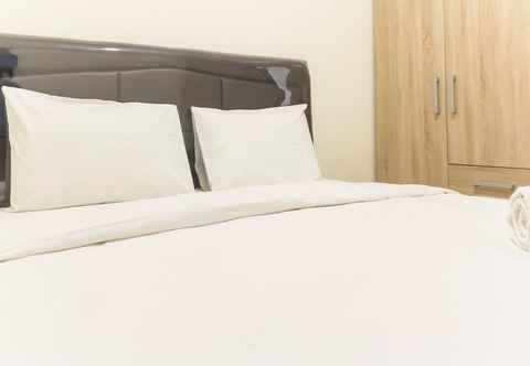 Kamar Tidur Cozy Stay and Homey 2BR at Meikarta Apartment By Travelio