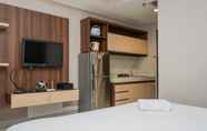 Bedroom 6 Comfy Studio Apartment near Summarecon Mall Serpong at Atria Residences By Travelio