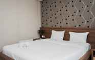 Bedroom 5 Comfy Studio Apartment near Summarecon Mall Serpong at Atria Residences By Travelio