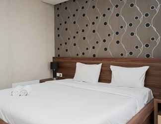 Bedroom 2 Comfy Studio Apartment near Summarecon Mall Serpong at Atria Residences By Travelio