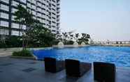 Swimming Pool 7 Luxurious and Comfy 2BR at West Vista Apartment By Travelio