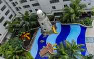 Swimming Pool 7 Comfortable and Spacious 2BR at Bassura City Apartment near Mall By Travelio