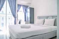 Kamar Tidur Cozy and Chic Studio at Serpong Garden Apartment By Travelio