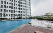 Kolam Renang 6 Cozy and Chic Studio at Serpong Garden Apartment By Travelio